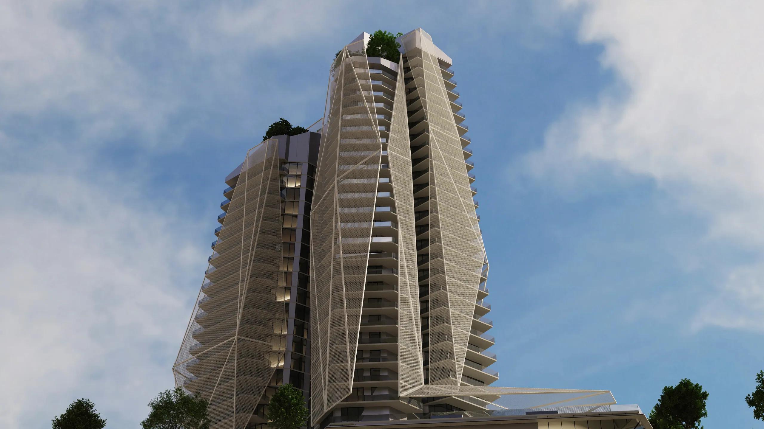Alba Tower's faceted twin volumes seen against a clear sky