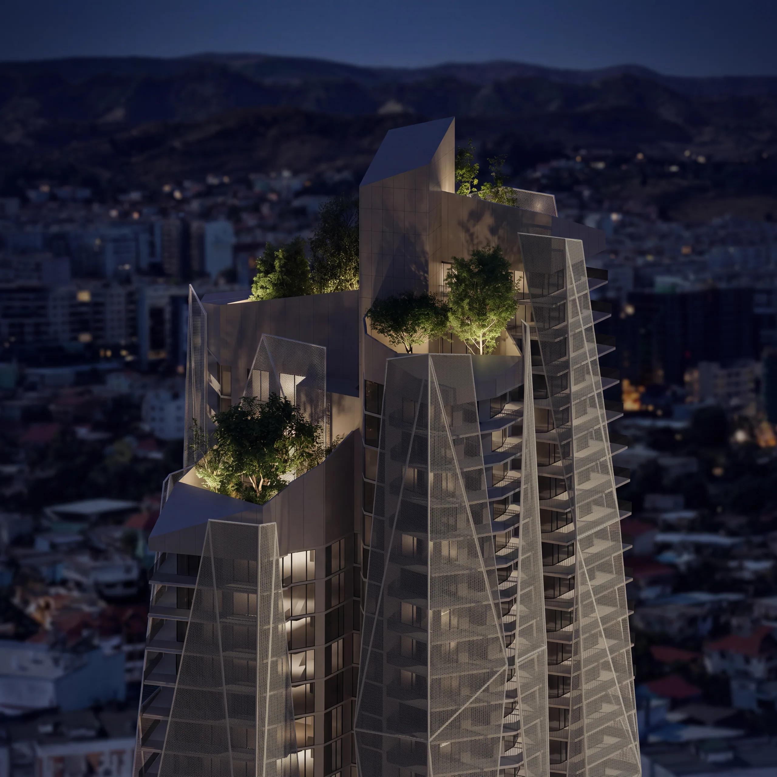 The planted rooftop terrace above the city at dusk