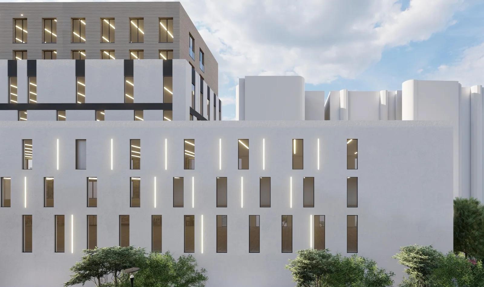 The white facade and its recessed slot windows
