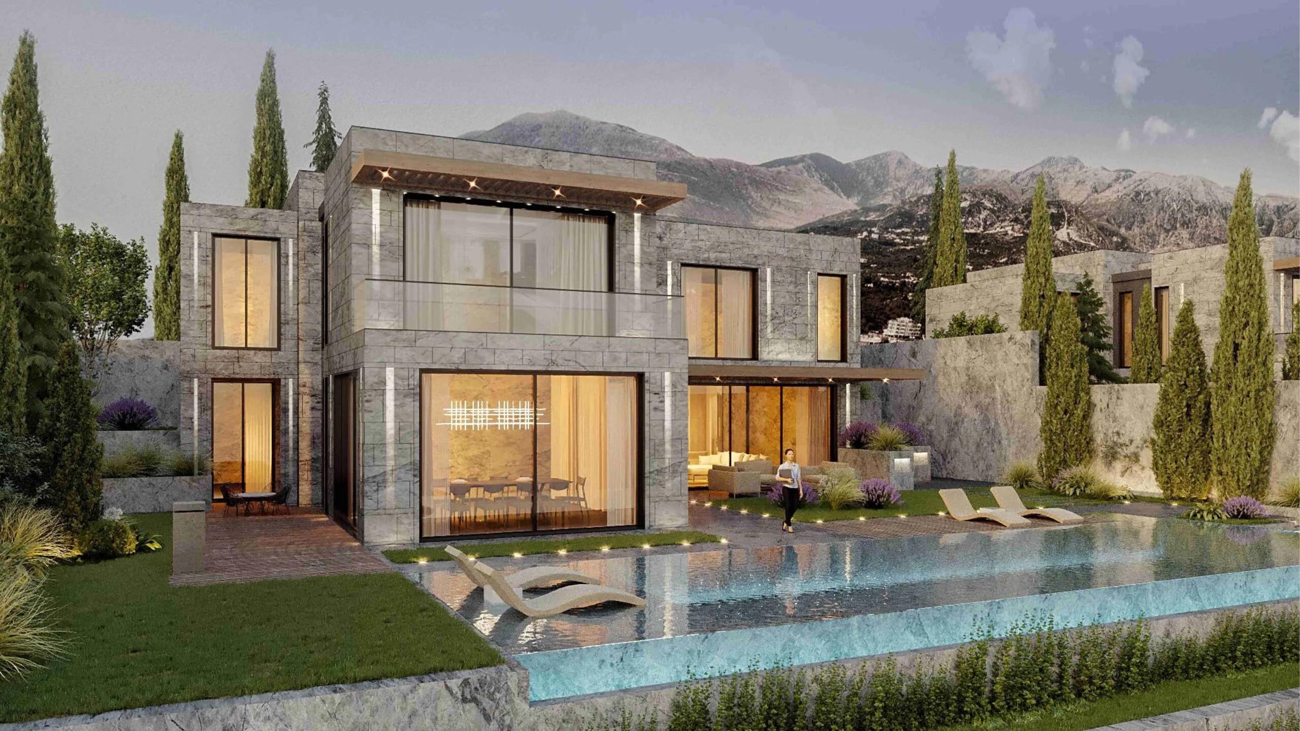 A private villa and pool with the mountains behind