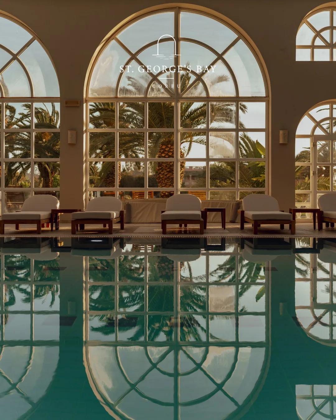 The main pool and gardens with the mountains beyond