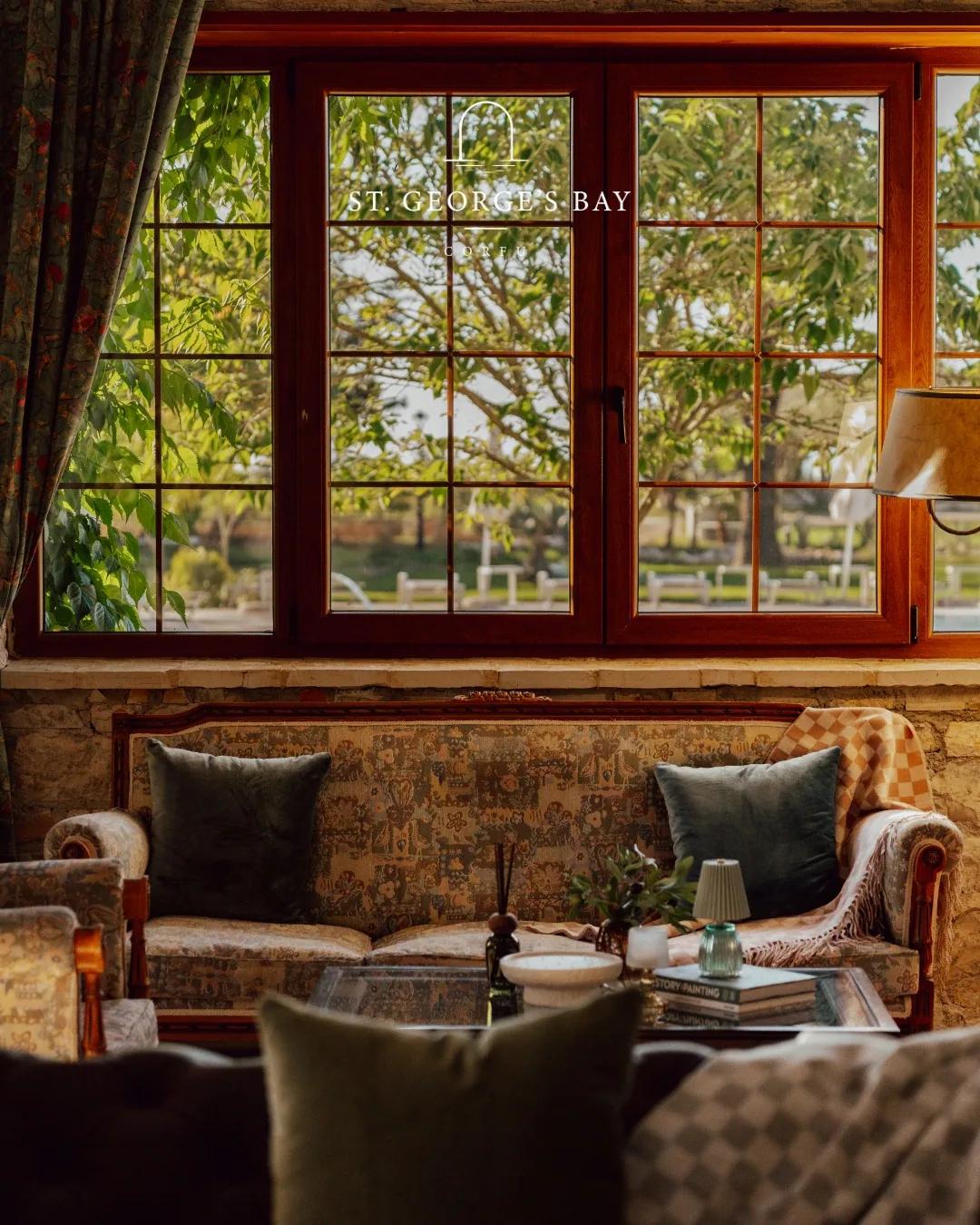 The lounge interior with its timber window bay
