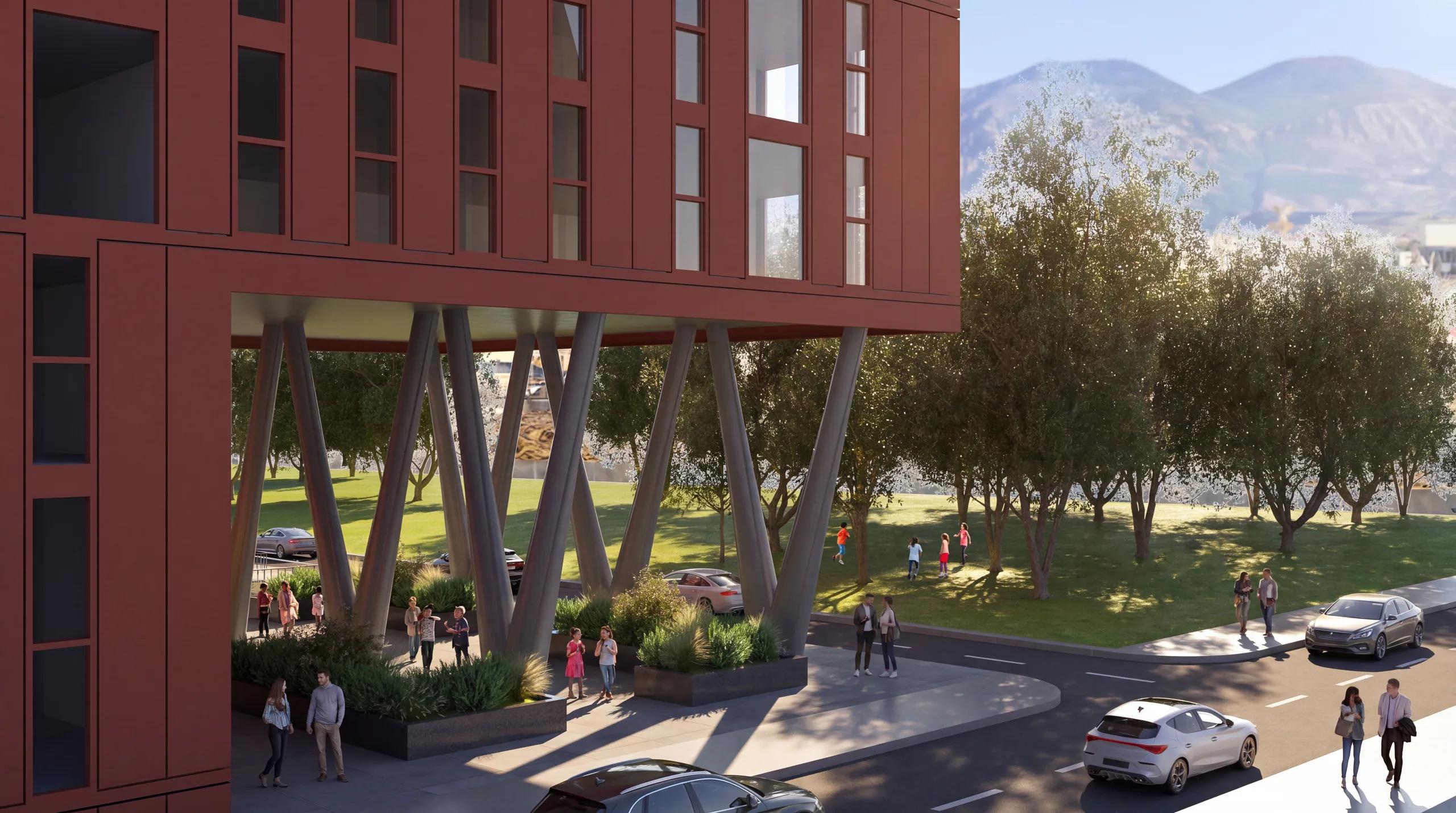 Residential volumes lifted above the ground plane on sculptural columns