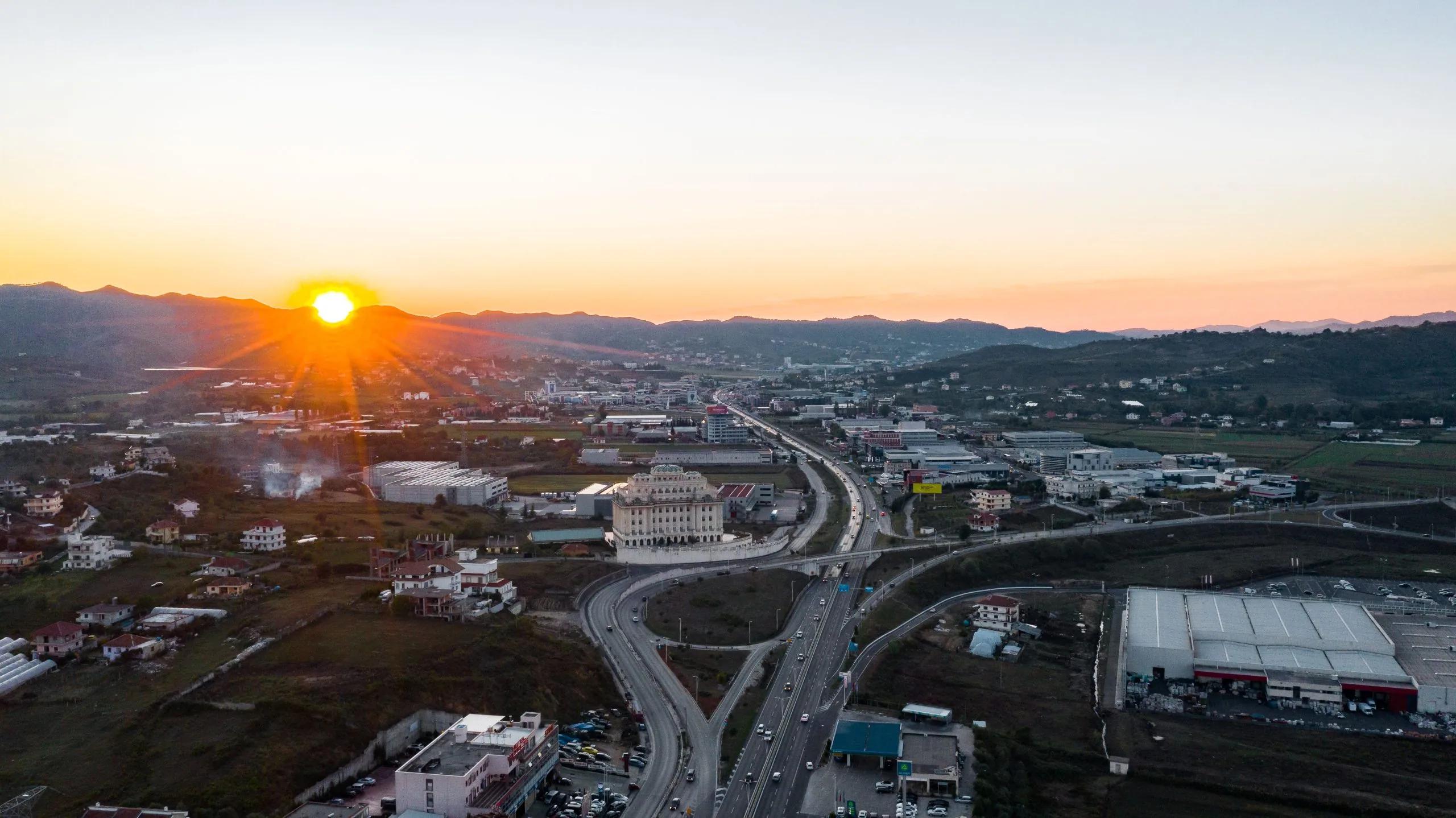 Sunset over the highway junction serving the park